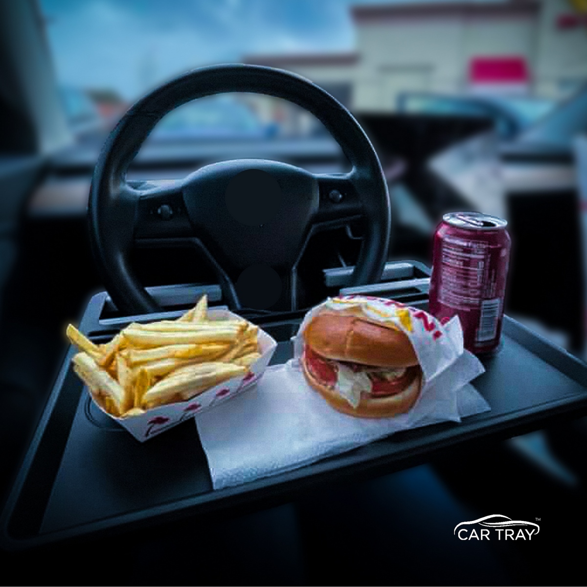 http://gigaaccessories.com/cdn/shop/products/ElonAccessories_CarTray_Driversidewithlunch_1200x1200.png?v=1641107740